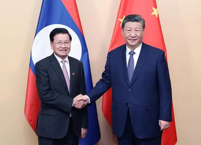 习近平会见老挝国家主席通伦 中方愿同老方加强交流互鉴